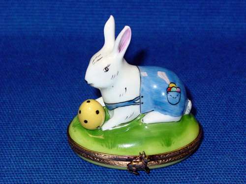 RABBIT WITH EGG WEARING BLUE PANTS